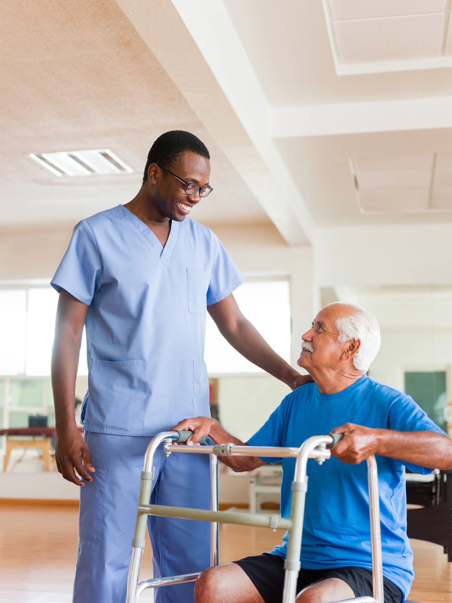 Care professional supporting a client in a healthcare environment
