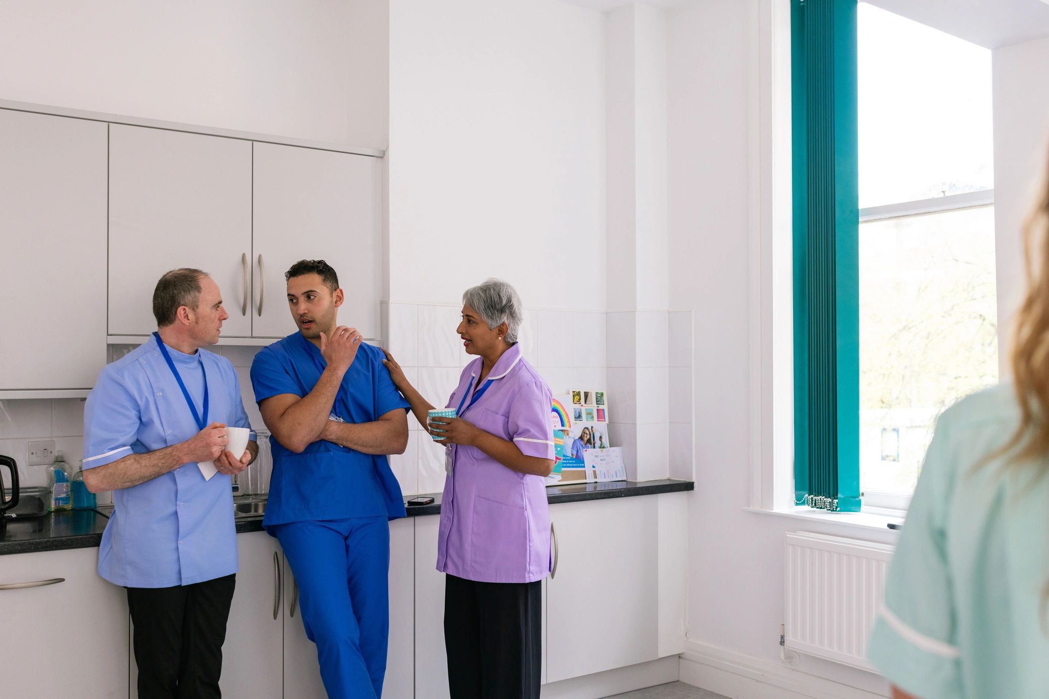 Support professionals standing together as a caring team