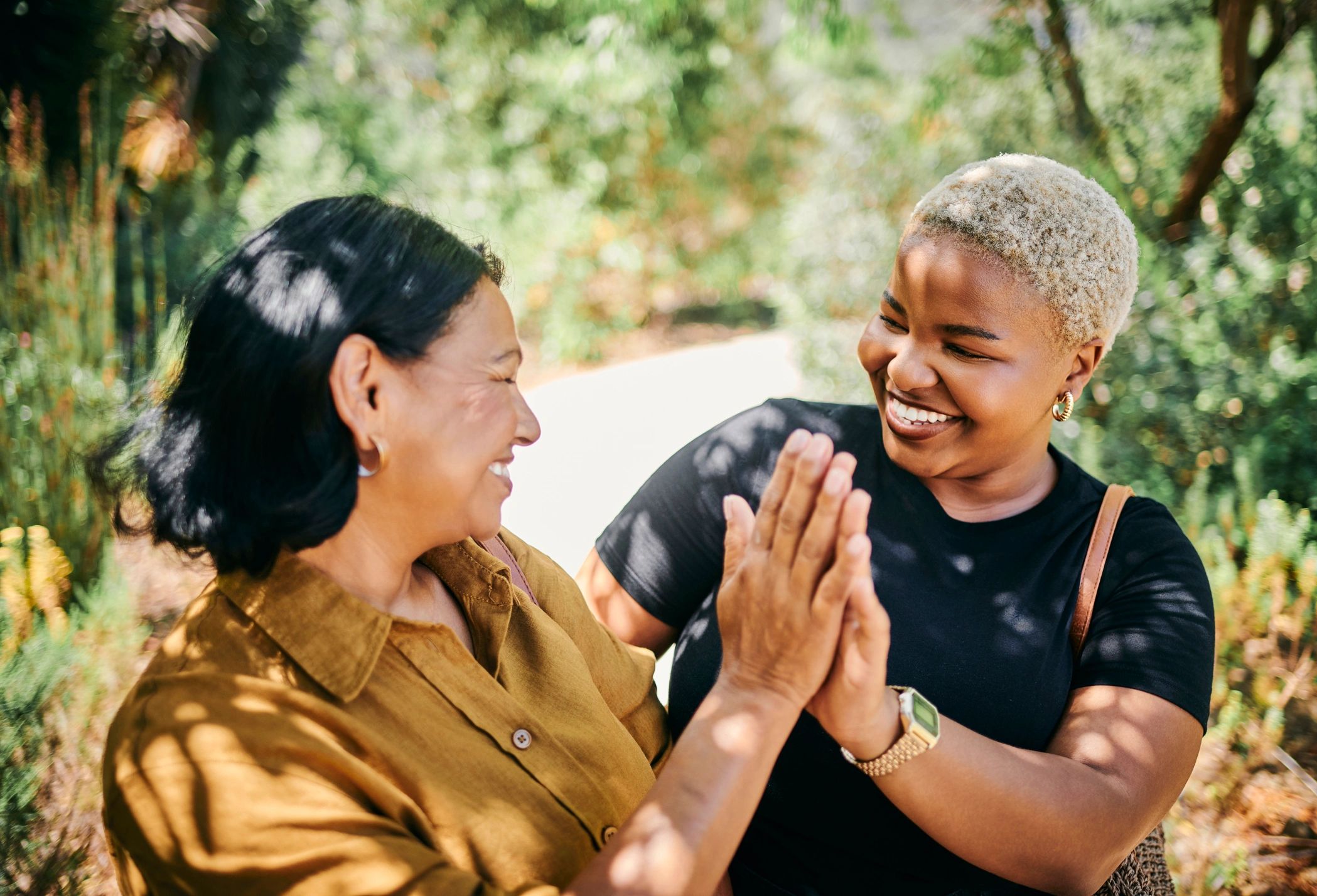 Caregiver and client walking together outdoors